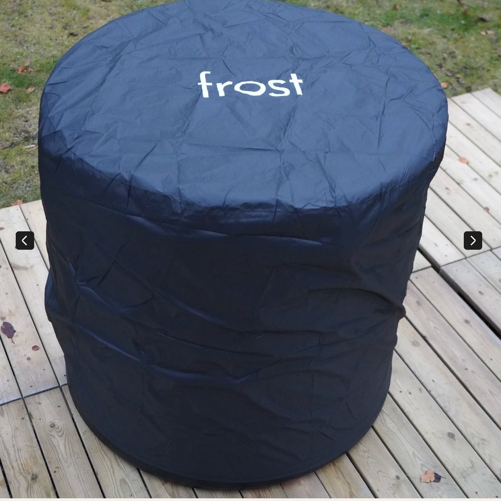 Black weather cover for inflatable ice bath with 'frost' branding on a wooden deck