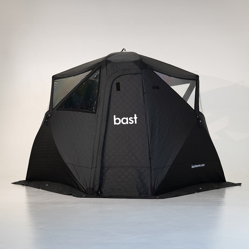 Black sauna tent with 'bast' branding on a white background