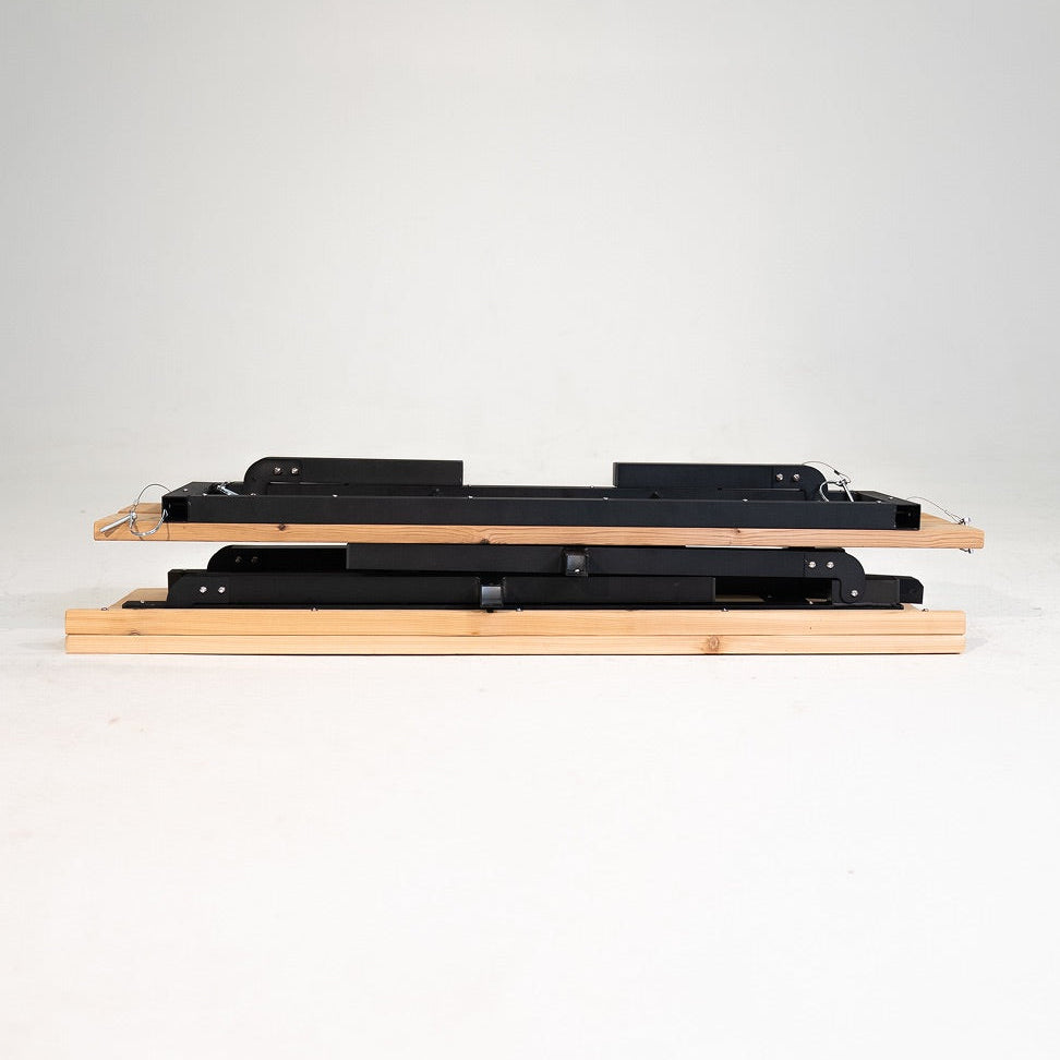 wooden bench with metal brackets folded down on a white background