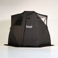 black pop-up sauna tent with 'bast' branding on a white background